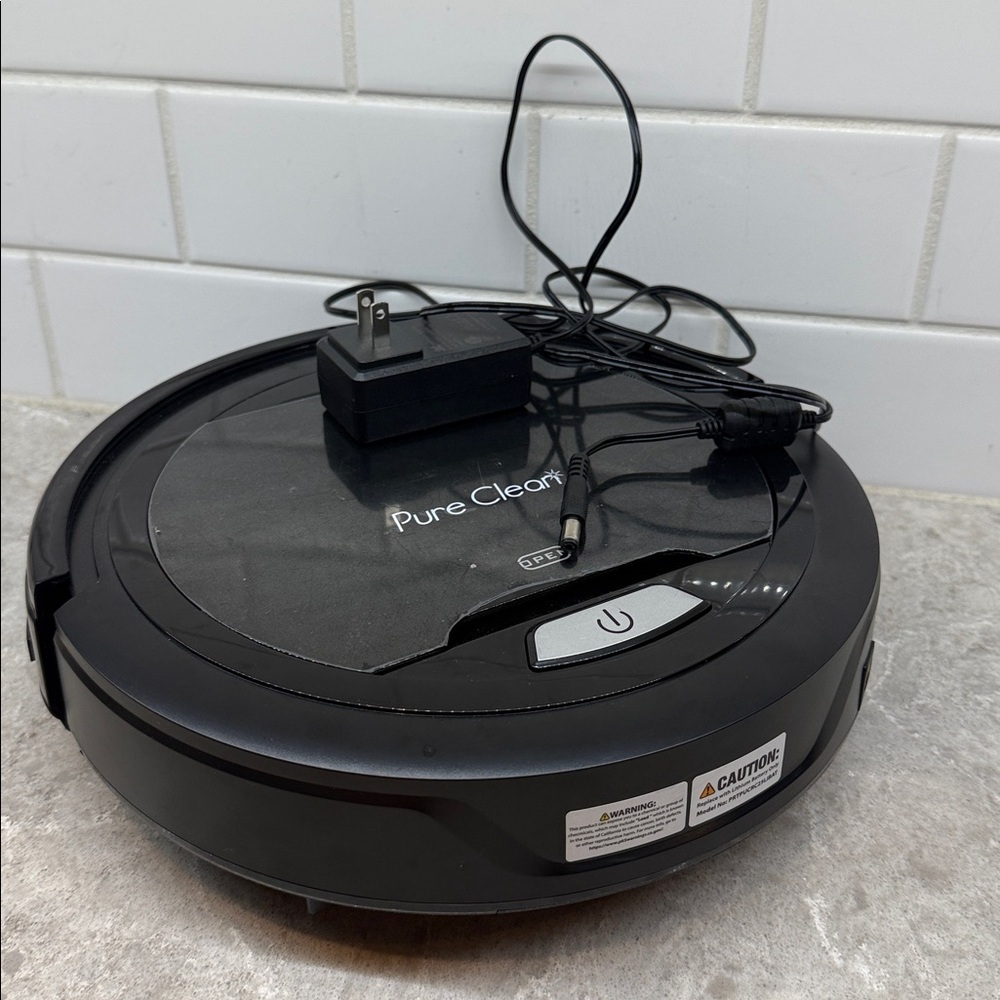Pure Clean Robot Vacuum Cleaner. Untested. Does not appear to work. For parts